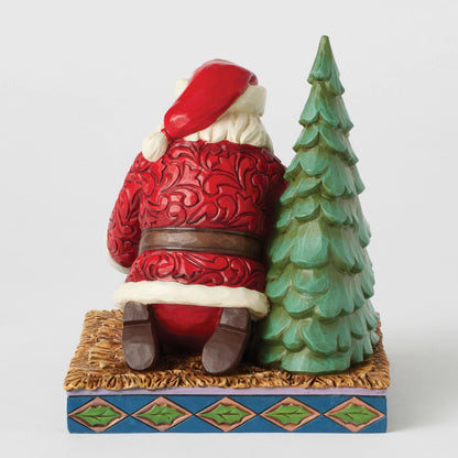 Santa Kneeling over Baby Jesus